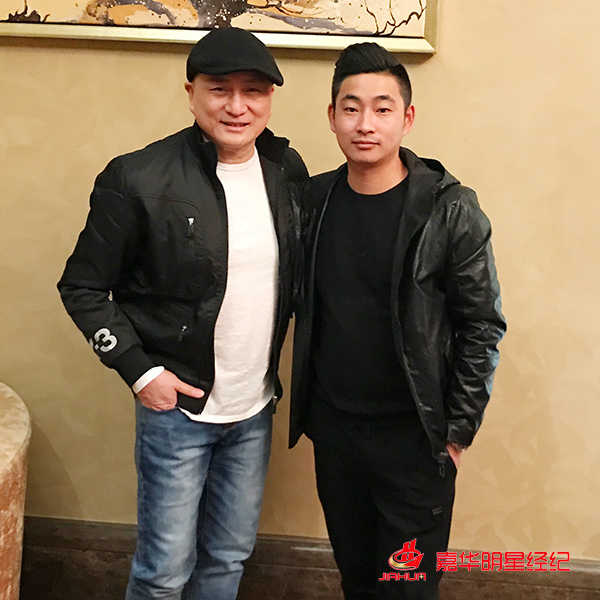 湯鎮(zhèn)業(yè)與經(jīng)紀人李志